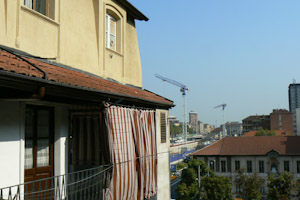 An old apartment building's shared balcony in Turin city center